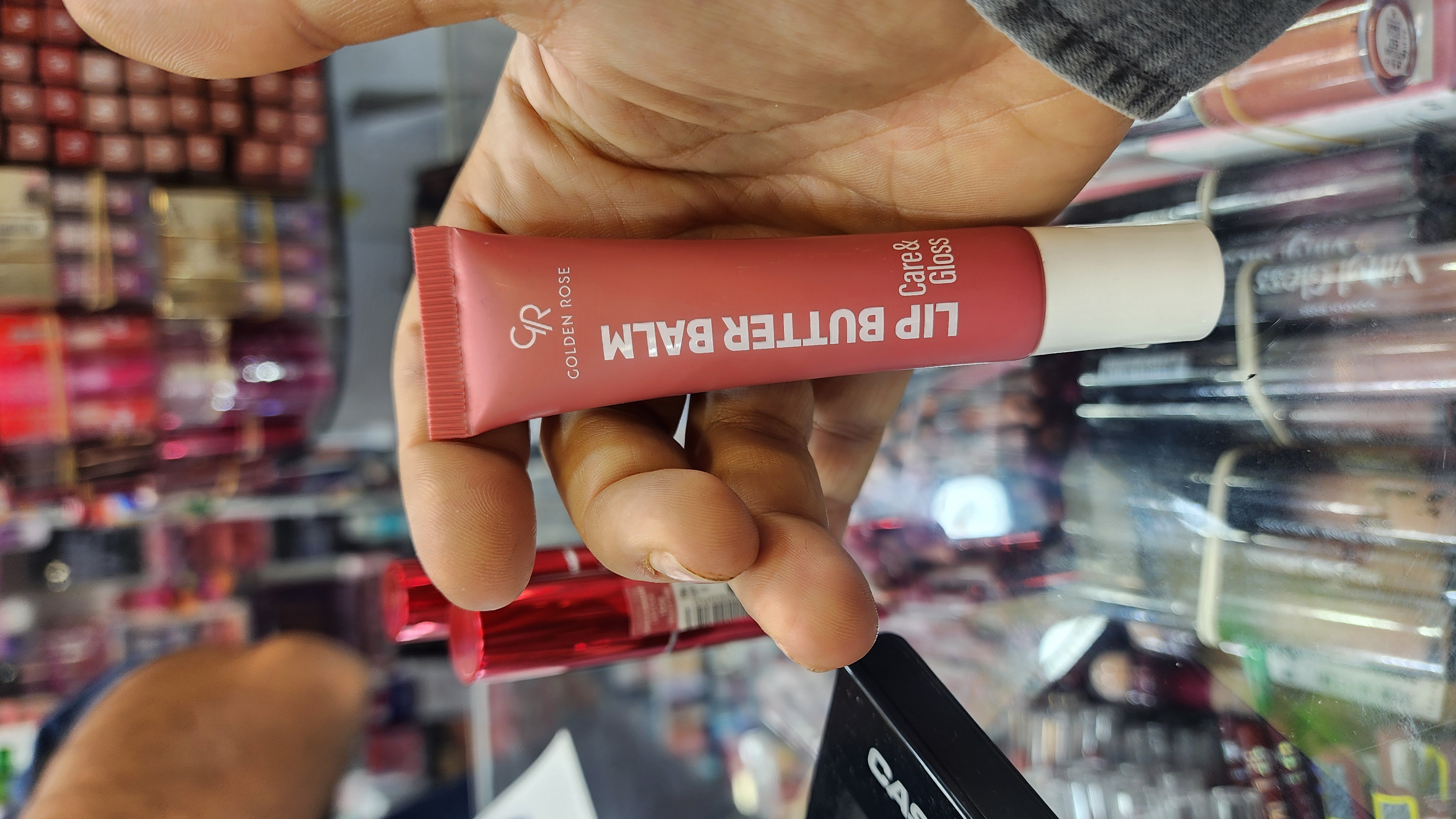 بالم لب گلدن رز CARE & GLOSS شماره 07 رنگ PEACHY GLOW